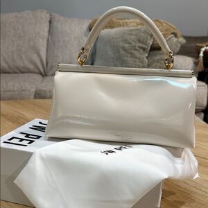 JW PEI Cream Glossy Clutch with Gold Accents